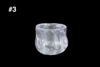 Handmade frosted glass guinomi cup with a rounded shape and richly textured silver white surface against a black background