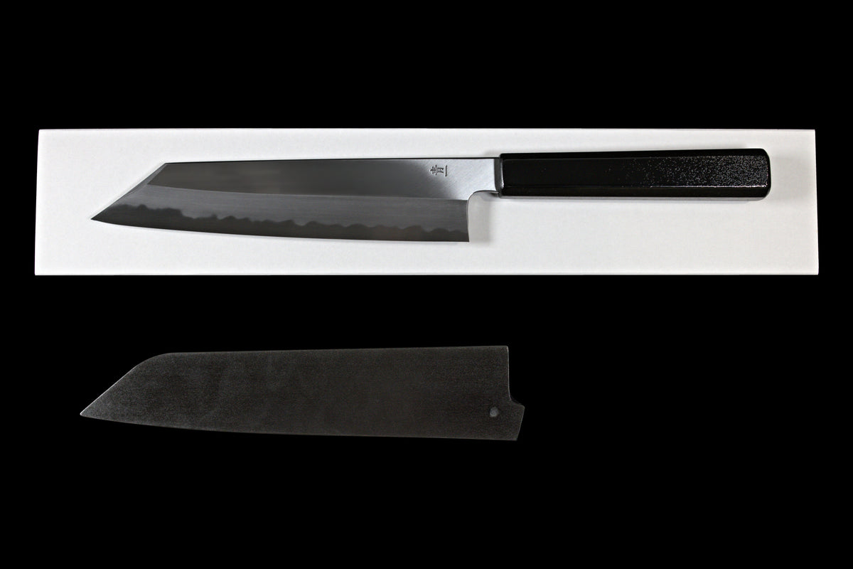 Gesshin Kagekiyo 210mm Blue #1 Kiritsuke Wa-Gyuto, back side with Blue #1 steel stamp, shown on its box with black saya below