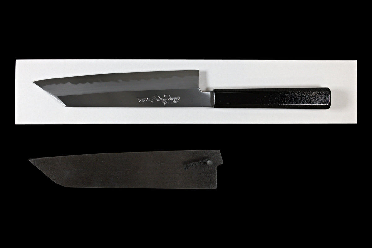 Gesshin Kagekiyo 210mm Blue #1 Kiritsuke Wa-Gyuto, front side with engraved maker's signature, shown on its box with black saya below