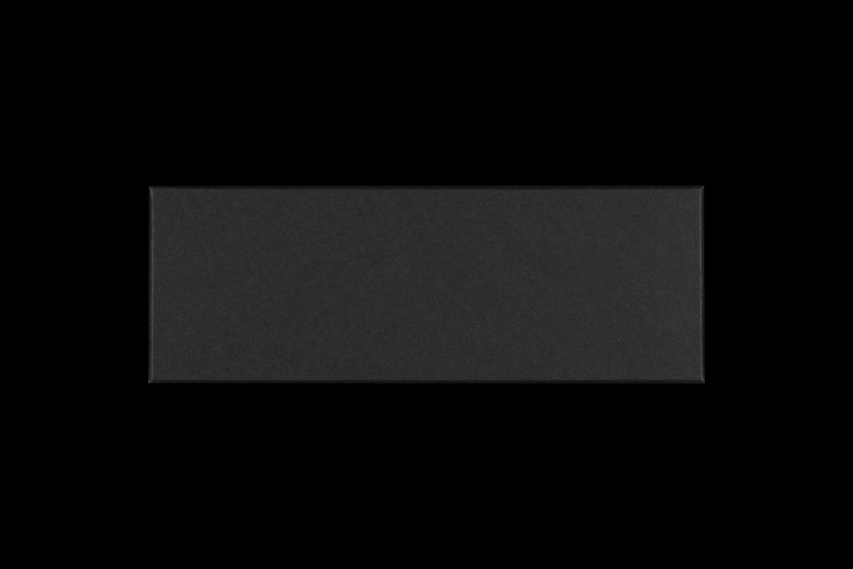 Closed dark gray box for hand forged narrow tip fish tweezers on a black background